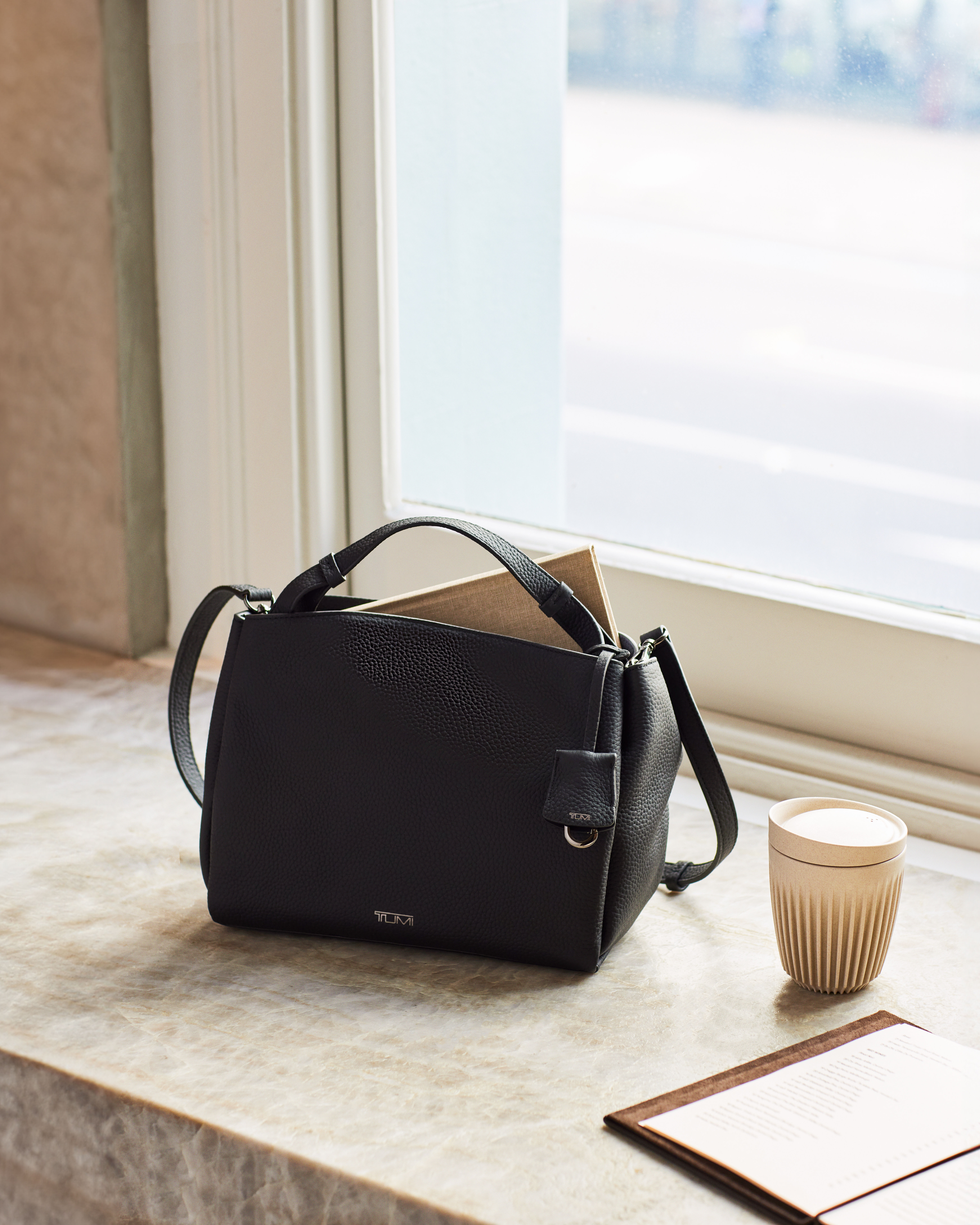 Tumi leather crossbody bag clearance