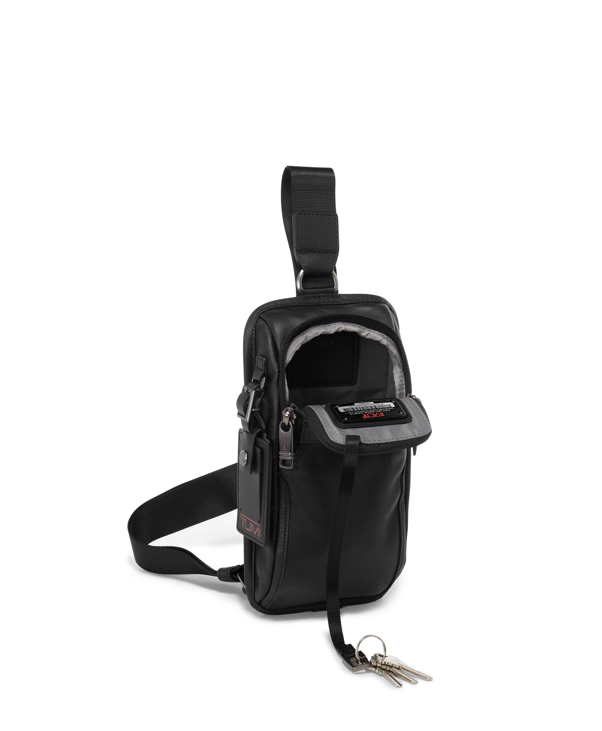 Tumi sling sale bag singapore