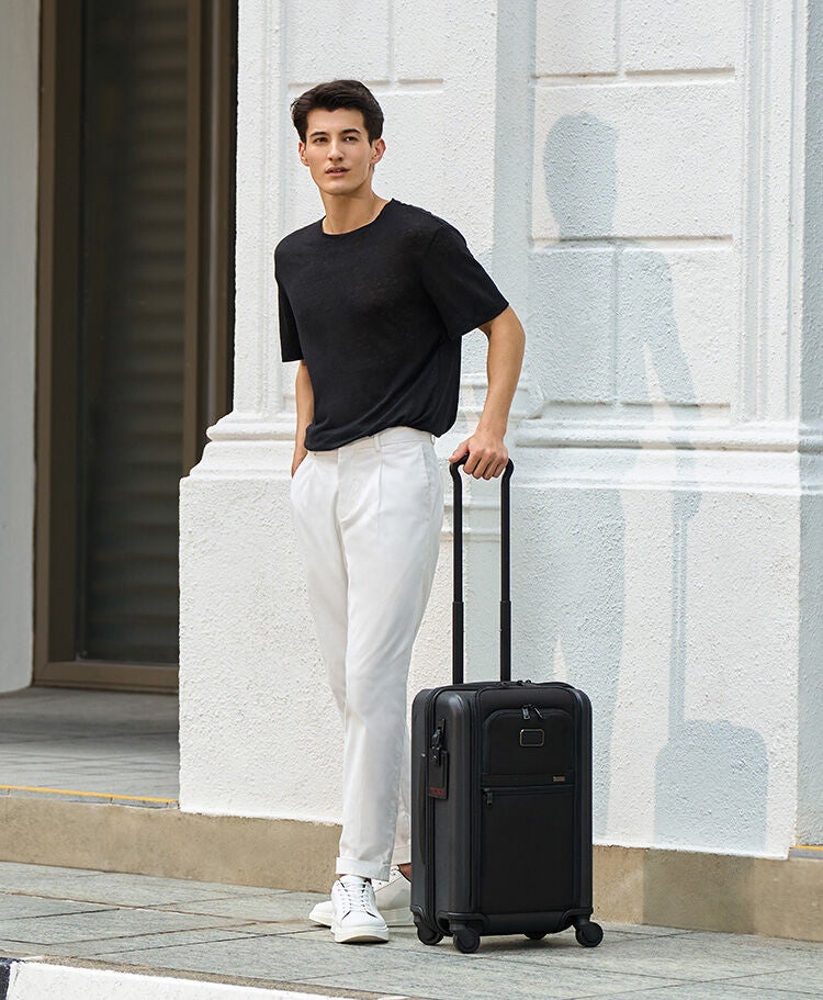 International Expandable 4 Wheeled Carry On in Black | Alpha